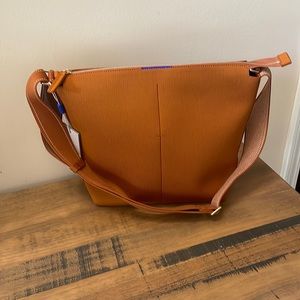 Rothy’s Mini Zip bucket bag. Brand new - tags still on. Retails for 179.